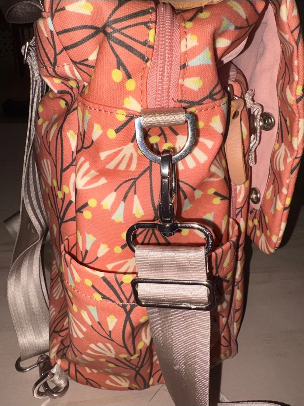 Petunia Pickle Bottom Coral Floral Baby Bag with Champagne Strap